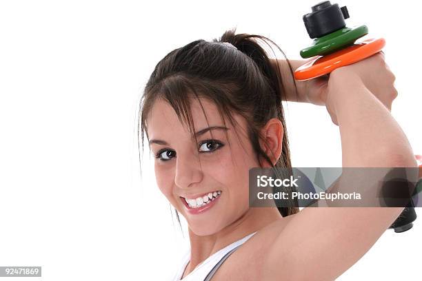 Beautiful Brunette Teen With Hand Weights Stock Photo - Download Image Now - American Culture, Beautiful People, Brown Hair