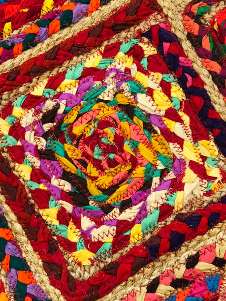 istock Colorful fabric stacks detail view close up 924719696