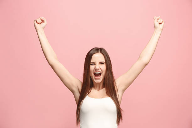 istock Winning success woman happy ecstatic celebrating being a winner. Dynamic energetic image of female model 924721096