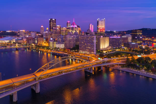 istock Pittsburgh Skyline Aerial At Dusk With Bridge and River 924723248