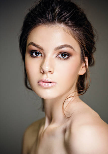 istock model with perfect make up elegant hairstyle and natural lip color 924723594