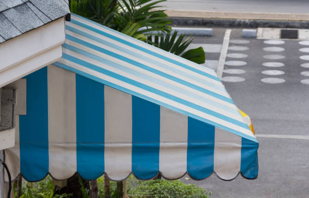 istock blue and white awning decor in front of the shop 924723928