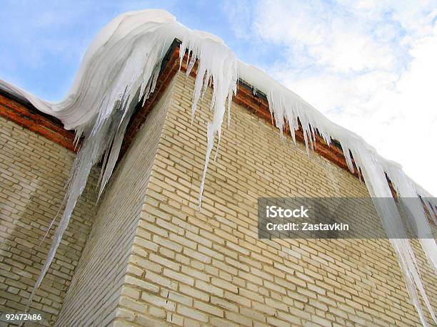 Icicles On The Roof Stock Photo - Download Image Now - Blue, Brick, Color Image