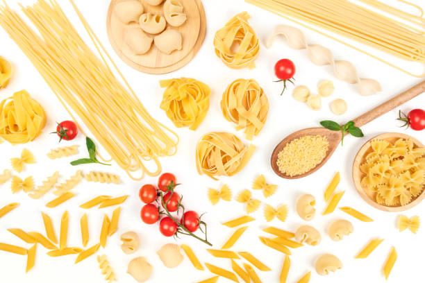 istock Overhead photo of different types of pasta on white 924728544