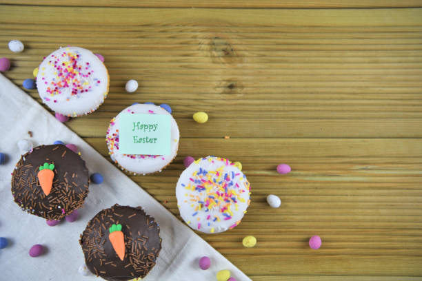 istock homemade mini cakes with Easter eggs and carrot decorations 924731804