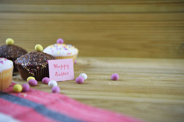 istock homemade vanilla and chocolate cakes with Easter eggs and words for happy Easter 924732086