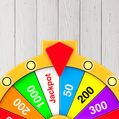 Luck and Fortune Concept. Spinning Colorful Fortune Wheel on a wooden background. 3d Rendering