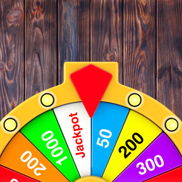 Luck and Fortune Concept. Spinning Colorful Fortune Wheel on a wooden background. 3d Rendering