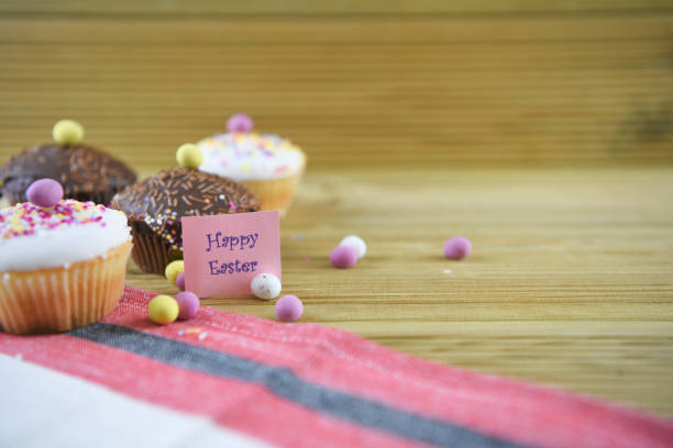 istock homemade vanilla and chocolate cakes with Easter eggs and words for happy Easter 924732422
