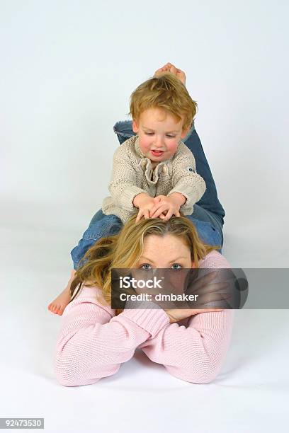 Mother Son Woman And Boy Child Playing Together Stock Photo - Download Image Now