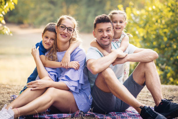 istock Mature parents with two kids in nature 924741460
