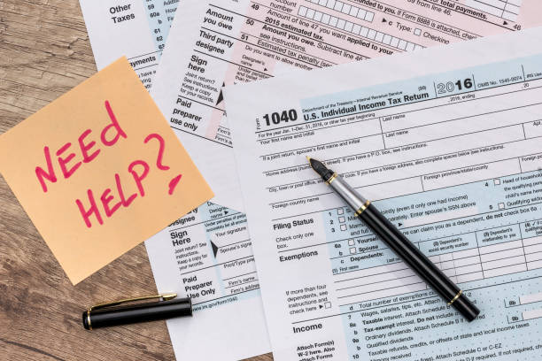 istock 1040 tax form with sticker - need help 924741602