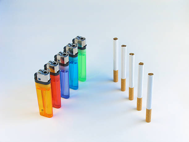 lighters and cigarettes stock photo