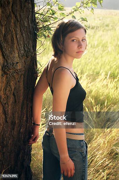 At A Tree Stock Photo - Download Image Now - 16-17 Years, 18-19 Years, Adolescence