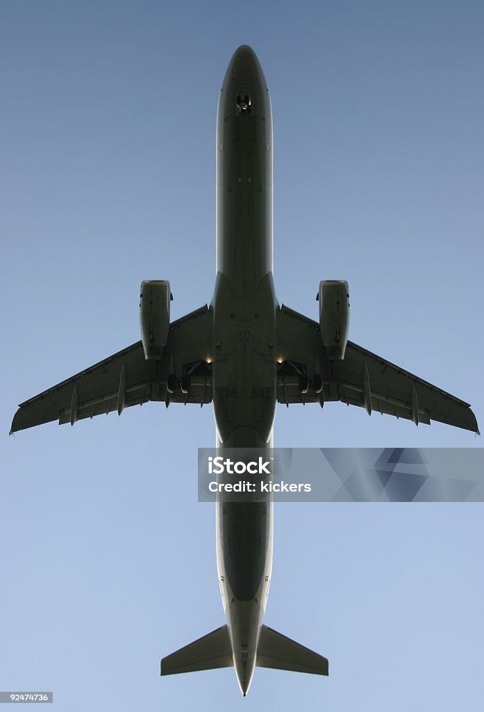 Airplane from below  Above Stock Photo