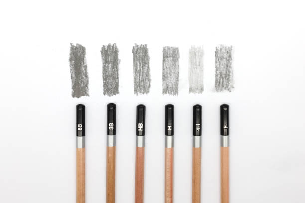 Group of pencils samples with different types of graphite, 8B, 3B, HB, H, 4H, F. stock photo
