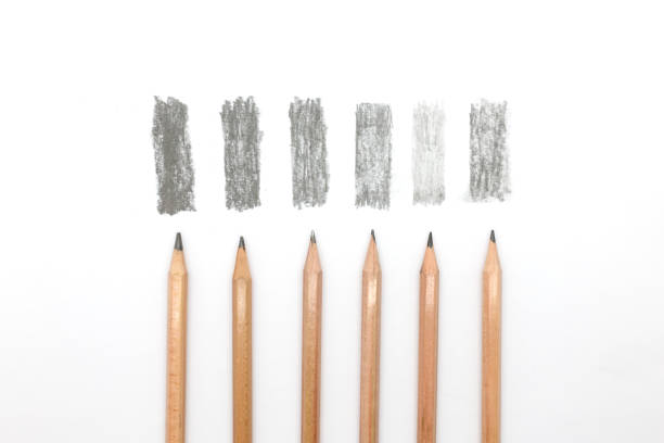 Group of pencils samples with different types of graphite, 8B, 3B, HB, H, 4H, F. Close up isolated horizontal crop