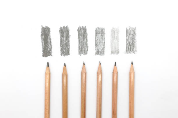Group of pencils samples with different types of graphite, 8B, 3B, HB, H, 4H, F. stock photo