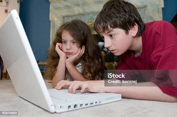 Laptop Kids 2 Stock Photo - Download Image Now - Brother, Casual Clothing, Child