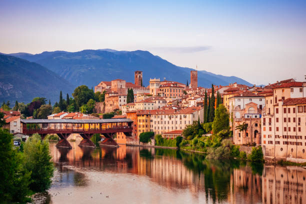 istock Bridge Over River By City Against Sky 924752190