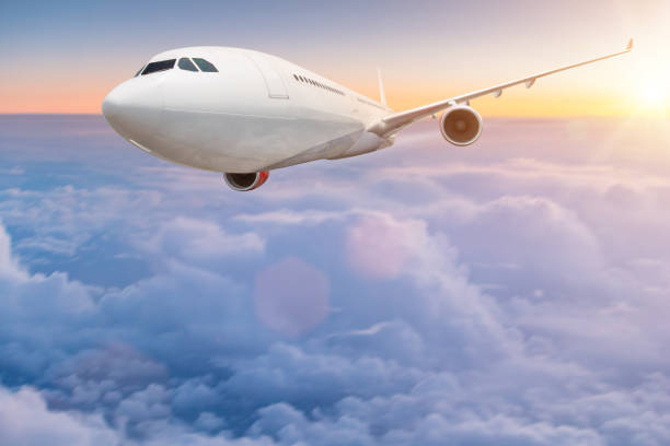 istock Commercial airplane flying above clouds 924752198