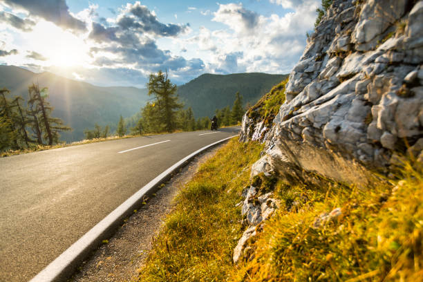 istock Motorcycle driver riding in Alpine highway, Nockalmstrasse, Austria, Europe 924752724