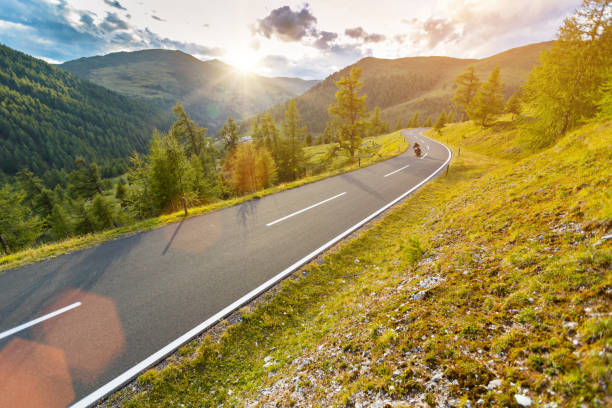 istock Motorcycle driver riding in Alpine highway, Nockalmstrasse, Austria, Europe 924752814