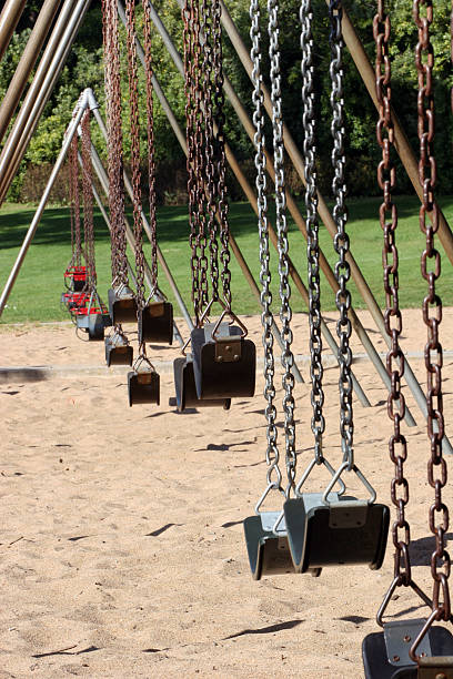 istock Row of swings 92475755