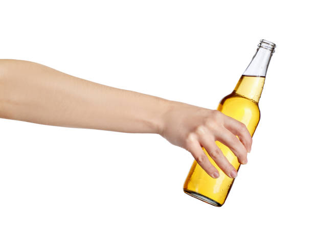 istock female hand with beer bottle 924760292