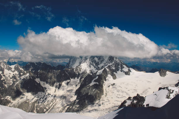 istock Scenic View Of Snowcapped Mountains Against Sky 924764298