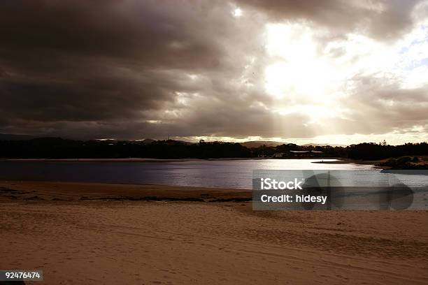 Tempestuosa Praia - Fotografias de stock e mais imagens de Anoitecer - Anoitecer, Areia, Crepúsculo