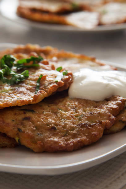 istock Vegetable pancakes with parsley and sour cream 924765618