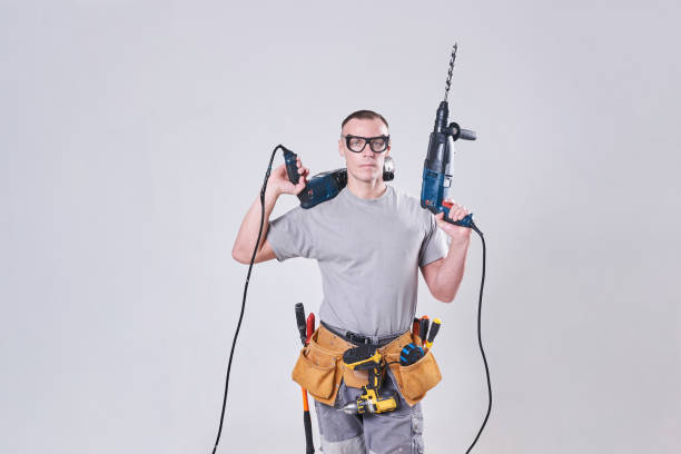 istock Master-Builder-finisher in their working clothes, with two hammers in his hands 924766542