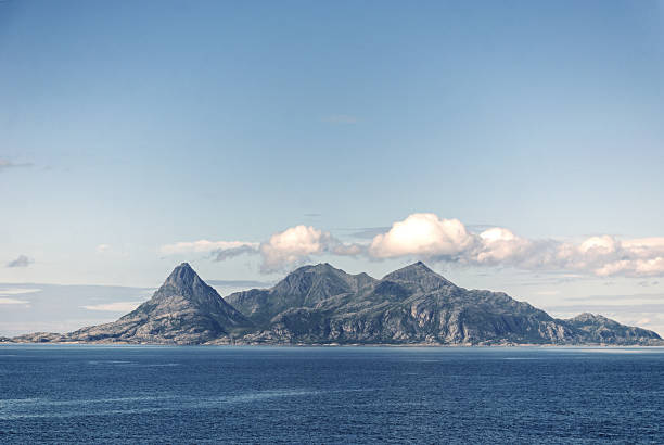 istock Mountains and clouds on the island Helligvaer, Norway 924766652