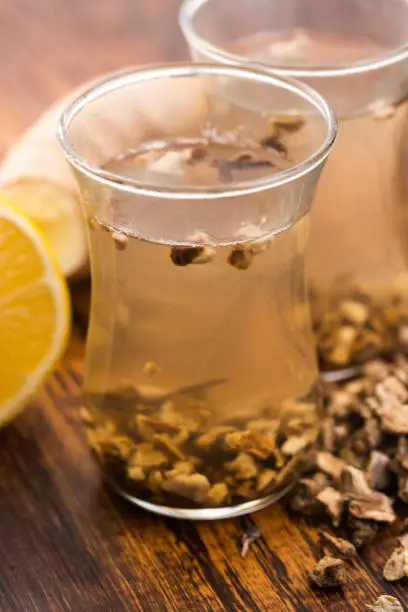 Teaglass with yellowhead root tea