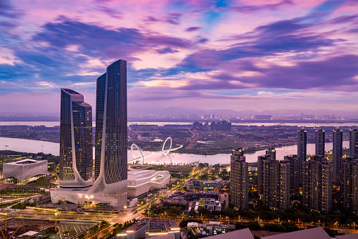 Nanjing International Youth Convention Center-designer Zaha Hadid.Beautiful city sunset in China