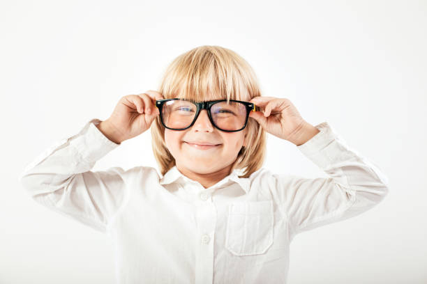 istock Smart boy is a graduate.  Schoolboy with glasses. 924785556
