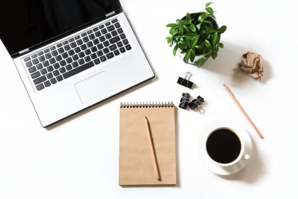 istock Open laptop on office desk table. Top view, copy space. 924786164