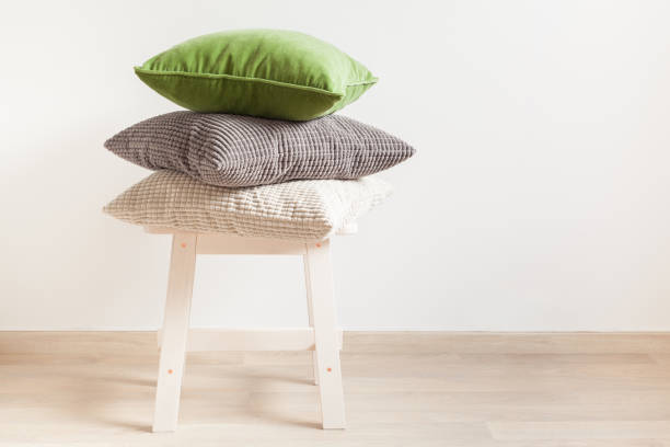 istock gray and green cushions cozy home 924786516