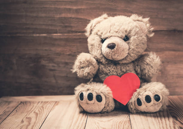 istock Soft toy with red heart. 924787226