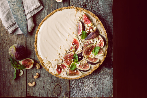 Delicious Tart with honey and mascarpone cheese cream and fresh figs, top view