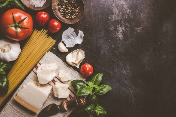 istock Top view of different vegetables and products for pasta making on rough table. 924797894