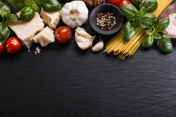 istock Top view of different vegetables and products for pasta making on rough table. 924797936