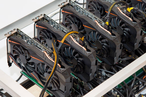 istock Graphics cards standing in a row in home mining farm. Close-up shot. Cryptocurrency industry. 924801042