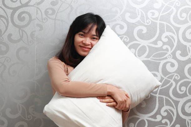istock the woman with pillow 924808264