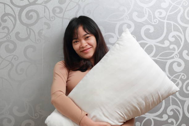 istock the woman with pillow 924808268