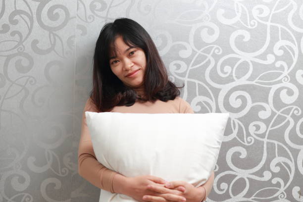 istock the woman with pillow 924808284