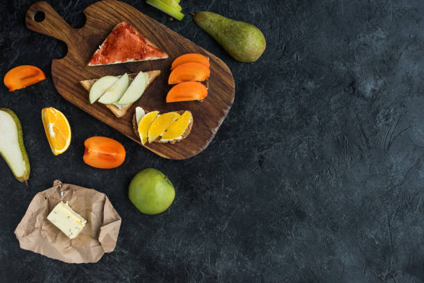 istock flat lay with ingredients for healthy breakfast on dark tabletop 924808386