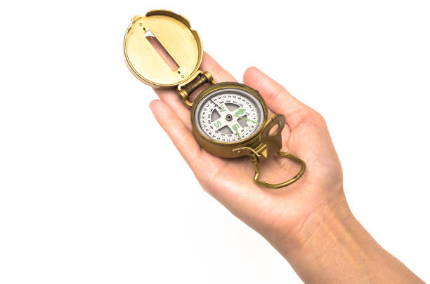 istock Gold compass isolated on white background. Travel equipment. 924813756