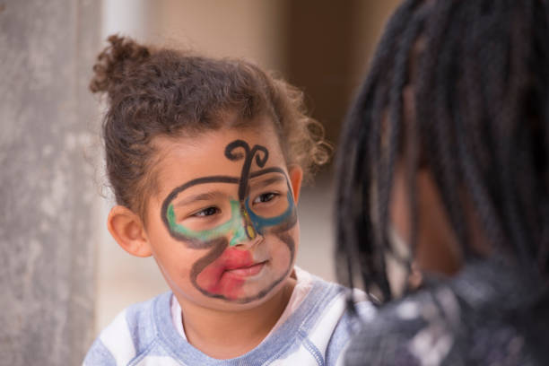 istock Girls party face painting. 924817564